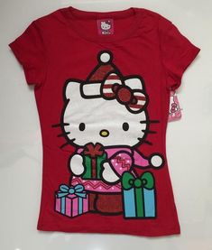 a hello kitty t - shirt with presents on it