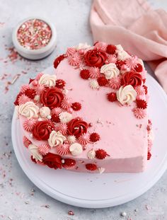 a heart shaped cake on a white plate