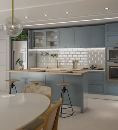 a modern kitchen with blue cabinets and white counter tops, an island in the middle