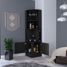 a bedroom with grey walls and white carpeted flooring, black shelving unit in the corner