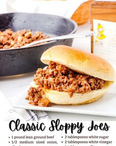 a sloppy joe sandwich on a plate with a skillet in the background and text that reads, classic sloppy joes