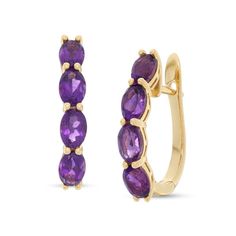 Add color to all your favorite looks with these vibrant gemstone hoop earrings. Fashioned in 14K gold, each striking hoop showcases a quartet of 6.0 x 4.0mm oval-shaped bright purple amethyst lining the front edge. Buffed to a brilliant luster, these earrings secure with hinged backs. Oval Huggie Earrings Fine Jewelry, 14k Gold Oval Huggie Earrings Fine Jewelry, Classic Yellow Gold Hoop Earrings With Gemstone, Vintage Tarot, Gemstone Hoop Earrings, Bright Purple, Purple Stones, Amethyst Earrings, Amethyst Stone