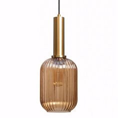 a gold colored pendant light hanging from a ceiling