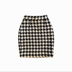 This Vintage Houndstooth Moschino Skirt Has Every Bit Of Class That You Desire. It Is A Size 4, However I Am Listing It As Size Two Because This Has Been Altered At The Waist. Measurements Are Listed Below. Measurements Hips: 34 In” Waist: 22 In” Length: 19 In” Check Out Some Of My Other Listings: Chanel, Christian Lacroix, Dior, Dolce & Gabbana, Gucci, Moschino, Thierry Mugler, Versace. Blue Flower Skirt, Black Tweed Skirt, Vintage Dolce And Gabbana, Hot Pink Skirt, Chain Skirt, Vintage Houndstooth, Womens Denim Skirts, Crepe Skirts, Houndstooth Skirt