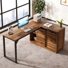 an office desk with a computer monitor and keyboard on it in front of a window