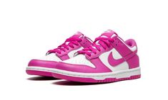 The Nike Dunk Low GS “Active Fuchsia” is the youth sizing of the classic basketball shoe in a colorway that undoubtedly turns heads with its pink accenting.  The “Active Fuchsia” gives the Dunk Low a can’t-miss vibe with the bright pink hue on the leather overlays against a white leather base.  The same neon pink is also found on the leather Swoosh on the sides, on the tongue tag with “Nike” branding, and on the laces.  It also appears on the rubber outsole that is paired with the white midsole. Nike Rosa, Nike Blazer Outfit, Jordan Rose, Nike X Travis Scott, Dr Shoes, Preppy Shoes, Dunks Nike, Cute Nike Shoes, Nike Dunk High