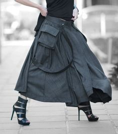 This long wool skirt is a must have for your wardrobe. Our Asymmetrical Long Skirt Zefira is a must have in your wardrobe, perfect for spring and summer as it can be dressed up or down. Cyberpunk Skirt, Plus Size Steampunk, Light Grey Skirt, Skirt With Suspenders, Dark Grey Skirt, Steampunk Skirt, Gothic Skirt, Steampunk Dress, Tulle Maxi Skirt