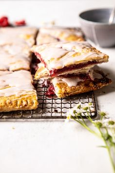 several desserts sitting on top of a cooling rack