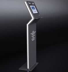 an electronic device that is on top of a black stand with the words, time and date displayed