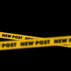 two yellow police tape with the words new post next to it on a black background