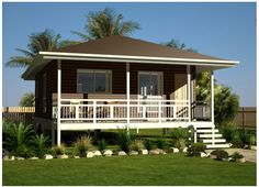 a house with white railings and balconies on the front porch is shown