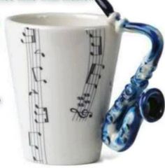 a blue and white coffee cup with musical notes on it