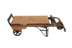 An industrial dolly and grain scale coffee table patented in 1911 and manufactured by Renfrew Scale Co. of Ontario, Canada as stamped on the tabletop. The handles and beveled edge tabletop are made of oak. The weighing scale measure is brass and the dolly, wheels and supports are cast iron as is the weighing tray. Sides are decorated with a red scrolled motif. Junking Ideas, Industrial Cart, Cart Coffee Table, Creation Art, Coffee And Cocktail Tables, Weighing Scale, Cocktail Tables, Ontario Canada, Beveled Edge