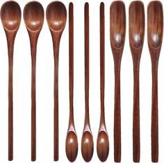 six wooden spoons lined up next to each other