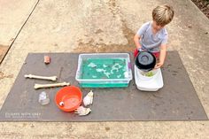 boy cleaning up his toys for halloween