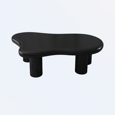 a black foot rest sitting on top of a white floor