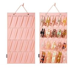 two pink wall hangings with different types of perfume bottles on them, one is open and the other is closed