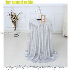 a round table with silver sequins on it