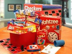 an assortment of games and snacks on a table