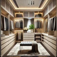 a large walk in closet with lots of drawers and clothes hanging on the walls, along with a bench