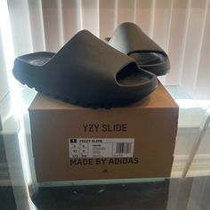 Brand New Black Yeezy Slides In Box With Tags Black Yeezy Slides, Slippers Yeezy, Yezzy Slides Outfits Girl Black, Yezzy Slippers Black, Flax Yeezy Slides, Yeezy Slides Outfit, Yeezy Slides, Black Slides, Black Slippers