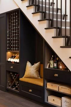 the stairs are open to reveal a wine cellar