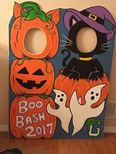 a halloween door hanger that says boo bash 2011 and two pumpkins on it