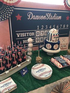 a baseball themed dessert table at a sports event