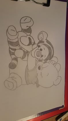 a drawing of winnie the pooh and tigger on a piece of white paper