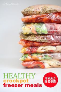 a stack of food wrapped in plastic bags with the words healthy meals written on it