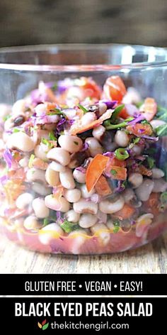 a glass bowl filled with black eyed peas salad