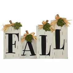 three wooden signs that say fall and one has leaves on it, the other is painted white