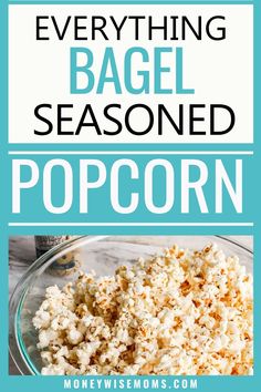 popcorn in a glass bowl with the words everything bagel seasoned popcorn on top and below