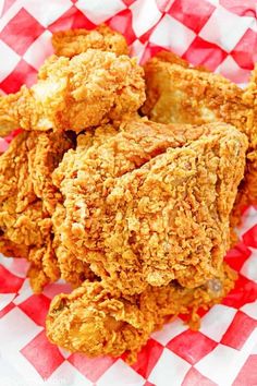 fried chicken on a red and white checkered paper