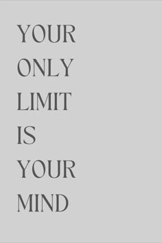 the words your only limit is your mind on a gray background with black and white lettering