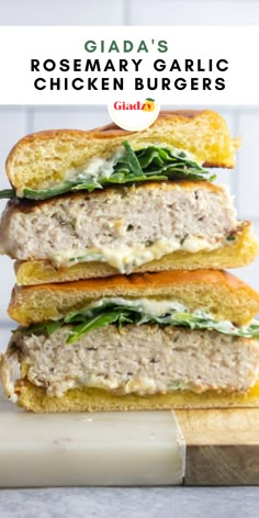 three sandwiches stacked on top of each other with the words galaa's rosemary garlic chicken burgers