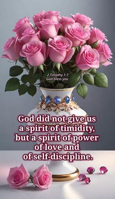 a vase filled with pink roses sitting on top of a table next to a quote