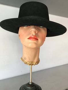 "Hard structure black felt hat. Seems to be an early hat, maybe as early as the 1930's. In good vintage condition. Measurements are: Circumference21\" Dome4\" Brim3\" Feel free to convo me with any further questions. Thank you for your interest." Vintage Wide Brim Felt Hat For Evening, Vintage Black Costume Hat With Flat Brim, Vintage Black Flat Brim Costume Hat, Vintage Black Adjustable Boater Hat, Vintage Adjustable Black Boater Hat, Vintage High Crown Fedora With Adjustable Fit, Vintage Fedora With High Crown, Vintage High Crown Fedora, Black High Crown Felt Hat With Adjustable Fit