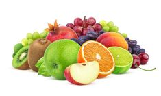 an assortment of fruit including apples, oranges, grapes and kiwi on a white background