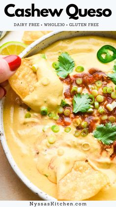 a bowl of quesadilla soup with tortilla chips