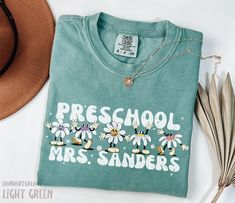 100 Days of School Prek Teacher Shirts, Custom Preschool Teacher Daisy Shirt, 100th Day Pre K Teacher Tee, Boho Pre-K Teacher Floral Shirt HOW TO ORDER ➀ Select color ➁ Select the size (Please check size chart) ✦ True to size. Size up 1-2 sizes for an oversized look. ➂ Add to cart ✦ (Optional) "Add message to Seller" on the checkout page. GARMENT FEATURES ✦ Crew neckline ✦ Direct to garment printing - no vinyl, decal, or iron-on technique ✦ Our designs are printed on the garment to last a long time and may not appear as 'glossy' or saturated as iron-on designs are. ✦ Please note that colors may appear different on different digital screens and may not be a true representation of the actual colors. ✦ Additional T-Shirt Colors and Sizes Available Upon Request ✧✧Brands: Bella Canvas Unisex 30 100 Days Of School Prek, Prek Teacher Shirts, Daisy Shirt, Prek Teacher, Pre K Teacher, Oversized Look, Teacher Tees, Preschool Teacher, Long T