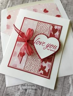 two cards with hearts and the words love you on them