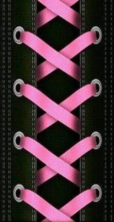 the pink ribbon is tied to the black background