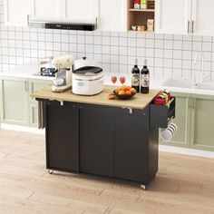 a kitchen island with wine bottles and other items on it