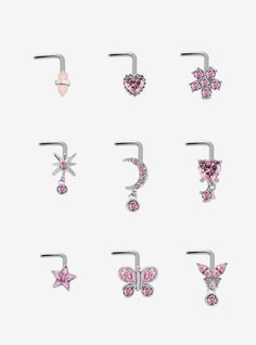 six pairs of piercings with pink and white stones on them, all in different shapes