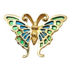 This is part of Chairish’s Costume Jewelry assortment.  Goldtone green and blue enamel small butterfly brooch with security clasp. Marked "NAPIER©." Measures: 1 inch tall by 1 3/8 inches wide. Excellent condition. The larger version of this brooch was featured in a circa 1971 advertisement. Bakelite Brooch, Small Butterfly, Vintage Rhinestone Brooch, Butterfly Brooch, Gold Brooches, Crystal Brooch, Pearl Brooch, Georg Jensen, Modern Branding