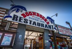 the front entrance to an outdoor restaurant