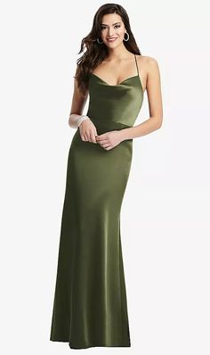 a woman in a long green dress