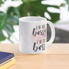 a coffee mug that says i'm not bossy, i'm the boss