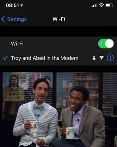 two men sitting next to each other in front of a tv screen with the caption wi - fi and troy and abel in the modern